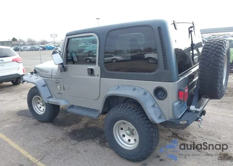 2000 Jeep Wrangler Sport z USA, uszkodzony, nr VIN 1J4FA49S2YP797321